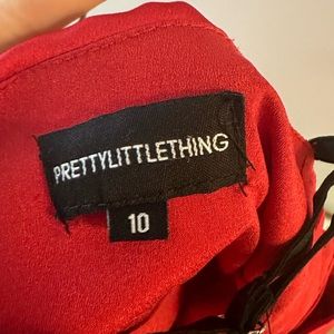 Pretty little thing ruched red dress.